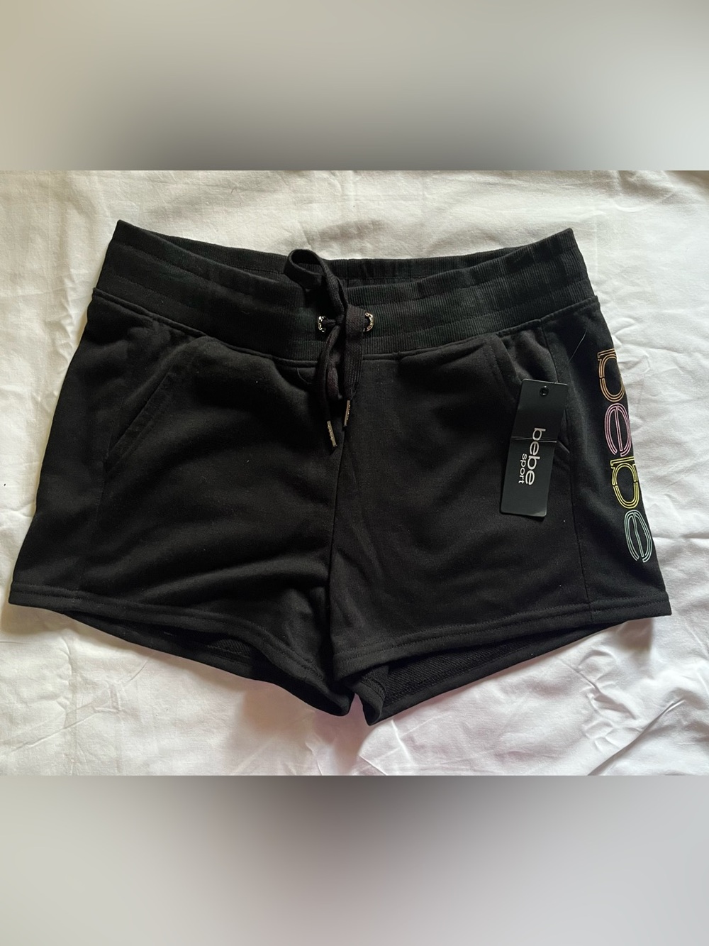 bebe sport Black Women’s Shorts with Pink, Yellow, Blue, Neon Logo Medium Size.